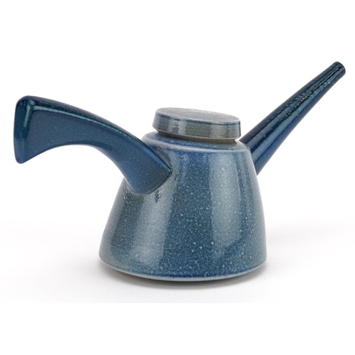 29 - A mid 20th century salt glazed studio pottery teapot by Jeremy Nichols, 28cm in length.