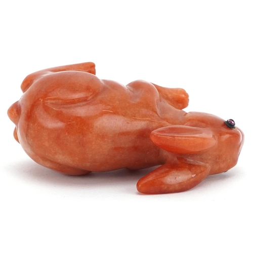 1264 - A Chinese carved jade study of a rabbit, 7cm in length, 111.8g.