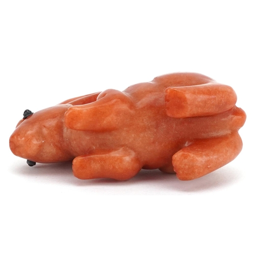 1264 - A Chinese carved jade study of a rabbit, 7cm in length, 111.8g.