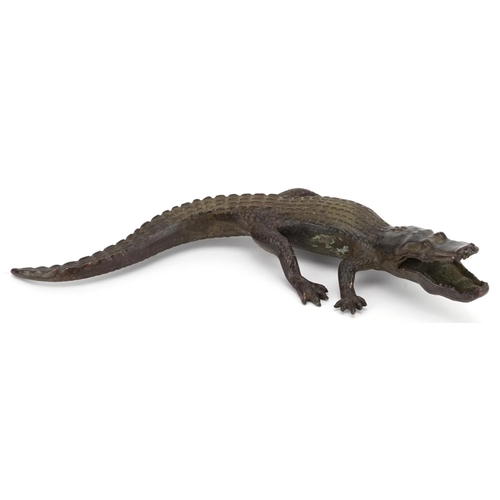 1174 - A patinated bronze study of crocodile, 17cm in length.