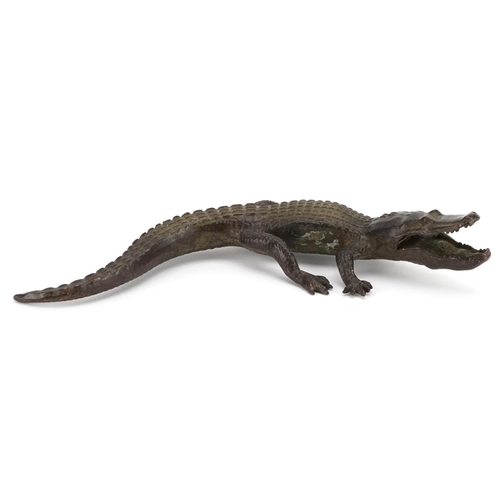 1174 - A patinated bronze study of crocodile, 17cm in length.