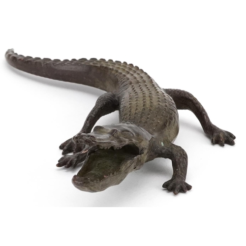 1174 - A patinated bronze study of crocodile, 17cm in length.