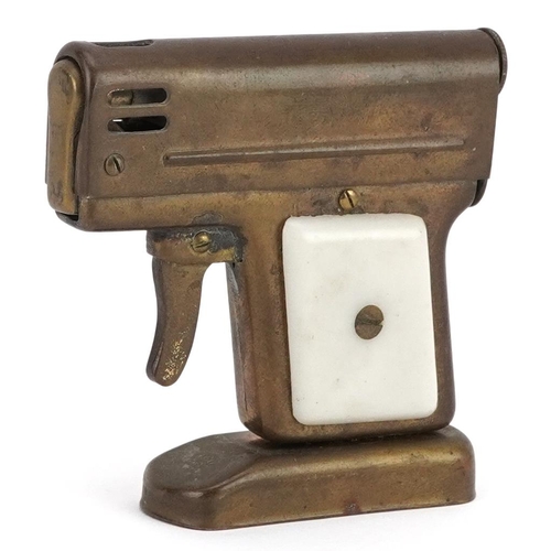 1171 - A novelty table lighter in the form of a pistol, 7cm high.