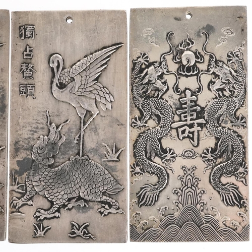 1324 - Five Chinese white metal scroll weights decorated with mythical animals, 9.8cm x 4.8cm, total 668.3g