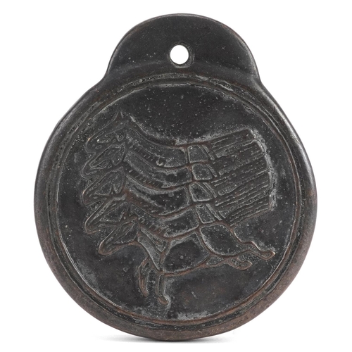 1278 - A Chinese bronze scroll weight decorated with horses and script, 11.5cm in length.