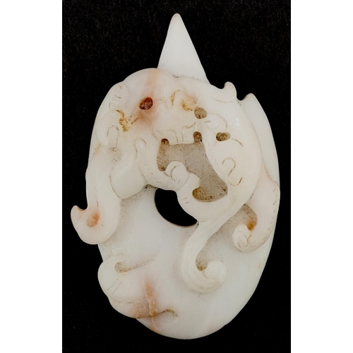 1316 - A Chinese white jade pendant carved with a mythical animal, 7cm high, 48.0g.