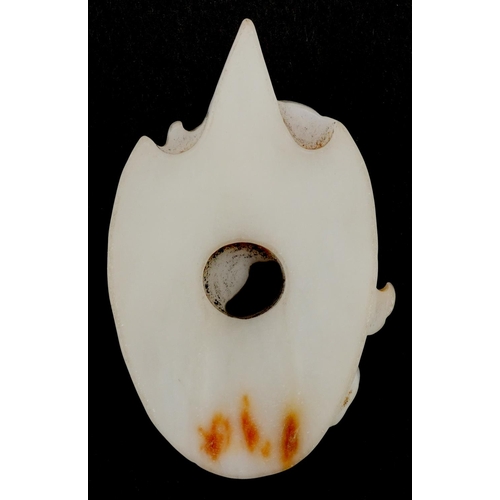 1316 - A Chinese white jade pendant carved with a mythical animal, 7cm high, 48.0g.