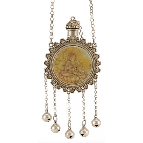 1275 - A Tibetan white metal scent bottle design necklace inset with a stone panel carved with Buddha, over... 