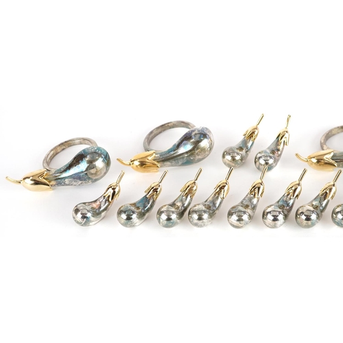 1357 - A set of Modernist silver plated napkin rings and napkin weights in the form of pears, the largest 7... 