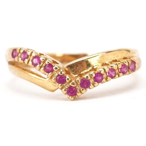 2206 - An 18ct gold pink spinel wishbone ring, size N/O, 2.8g.