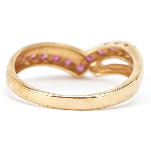 2206 - An 18ct gold pink spinel wishbone ring, size N/O, 2.8g.