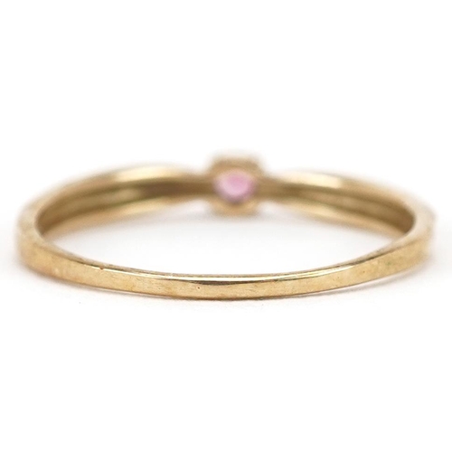 2390 - A 9ct gold pink stone solitaire ring, size N, 1.1g.