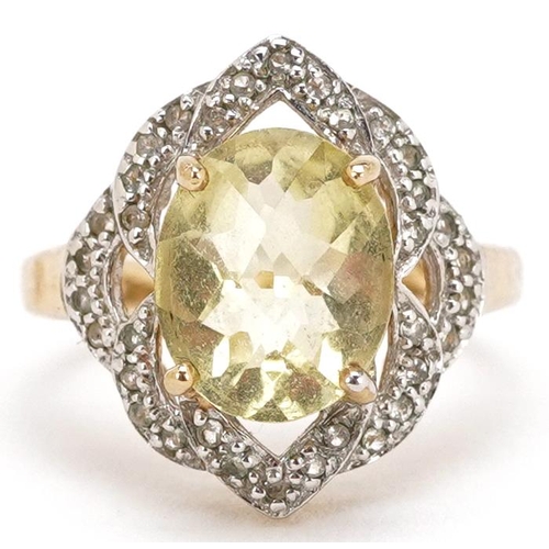 2391 - A 9ct gold citrine and diamond dress ring, size N, 4.3g.