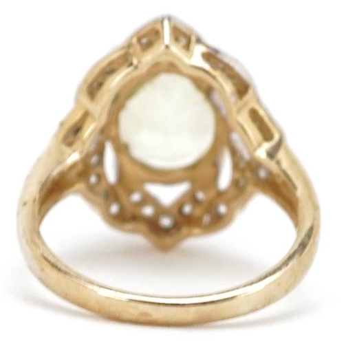 2391 - A 9ct gold citrine and diamond dress ring, size N, 4.3g.