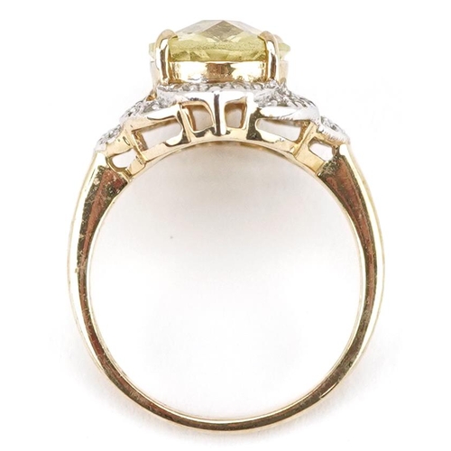 2391 - A 9ct gold citrine and diamond dress ring, size N, 4.3g.