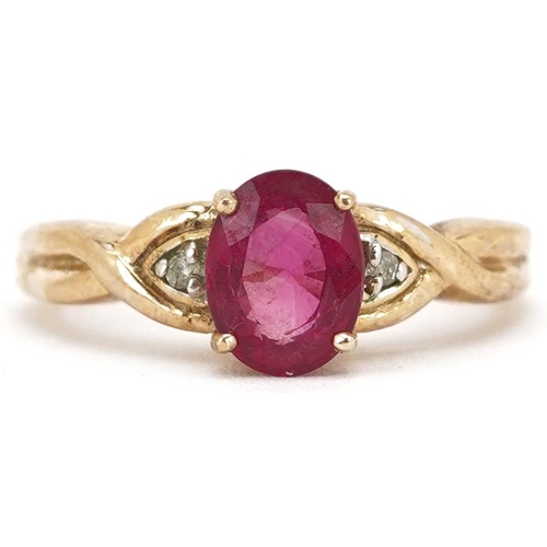 2198 - A 9ct gold pink stone solitaire ring with diamond set shoulders, size N, 2.8g.