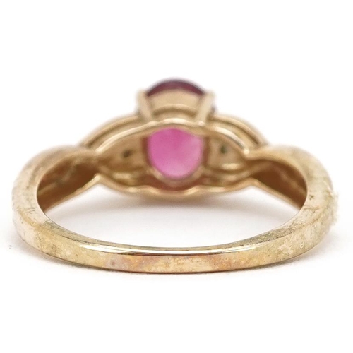 2198 - A 9ct gold pink stone solitaire ring with diamond set shoulders, size N, 2.8g.