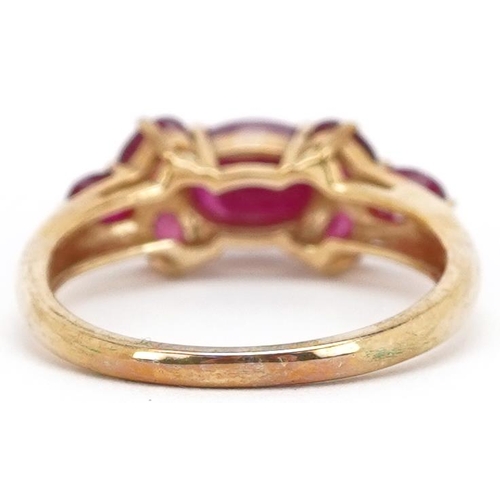 2203 - A 9ct gold ruby and pink spinel cluster ring, size N, 2.8g.