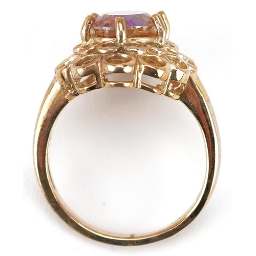 2165 - A 9ct gold rainbow quartz solitaire ring with ornate setting, size N, 4.9g.