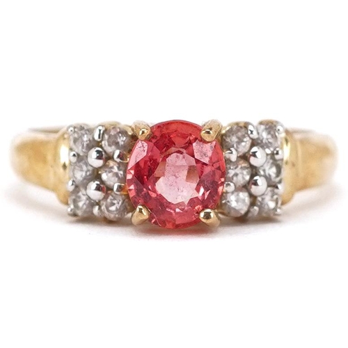 2146 - A 9ct gold pink sapphire and white spinel ring, size N, 2.6g.