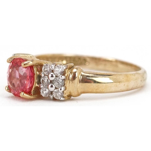 2146 - A 9ct gold pink sapphire and white spinel ring, size N, 2.6g.