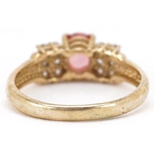 2146 - A 9ct gold pink sapphire and white spinel ring, size N, 2.6g.