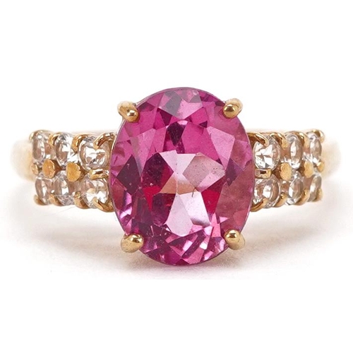 2341 - A 9ct gold pink topaz and white spinel ring, size N, 2.6g.