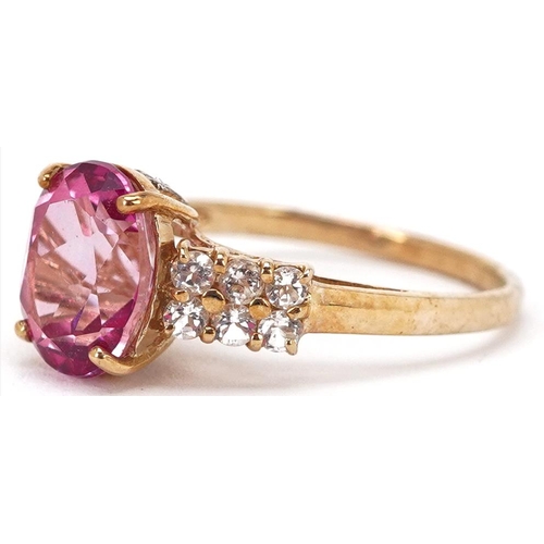 2341 - A 9ct gold pink topaz and white spinel ring, size N, 2.6g.