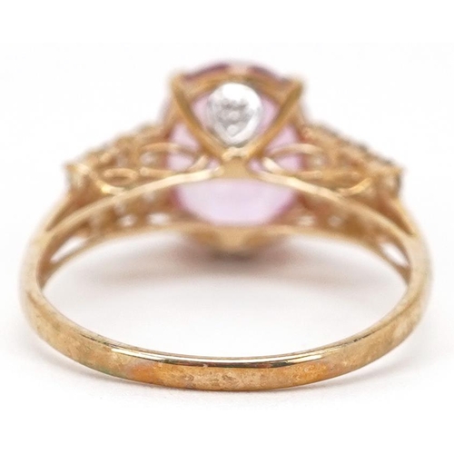 2341 - A 9ct gold pink topaz and white spinel ring, size N, 2.6g.