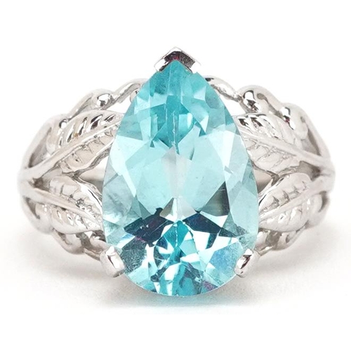 2324 - A 9ct white gold blue topaz teardrop ring with naturalistic setting, the topaz approximately 15.95mm... 