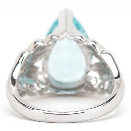 2324 - A 9ct white gold blue topaz teardrop ring with naturalistic setting, the topaz approximately 15.95mm... 