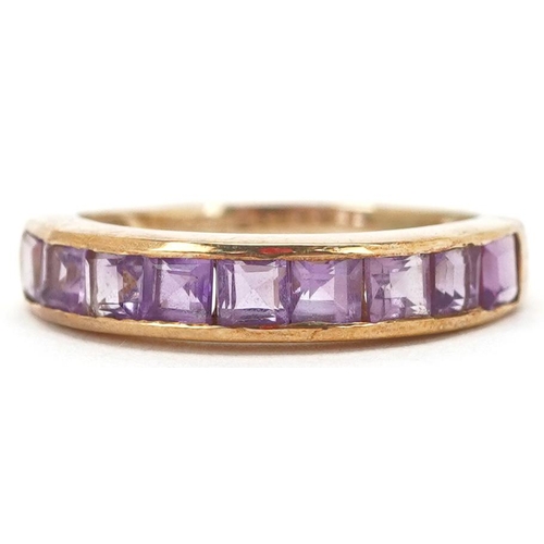 2355 - A 9ct gold amethyst half eternity ring, size N, 2.6g.