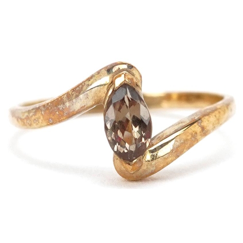 2359 - A 9ct gold yellow stone crossover ring, size N/O, 2.0g.