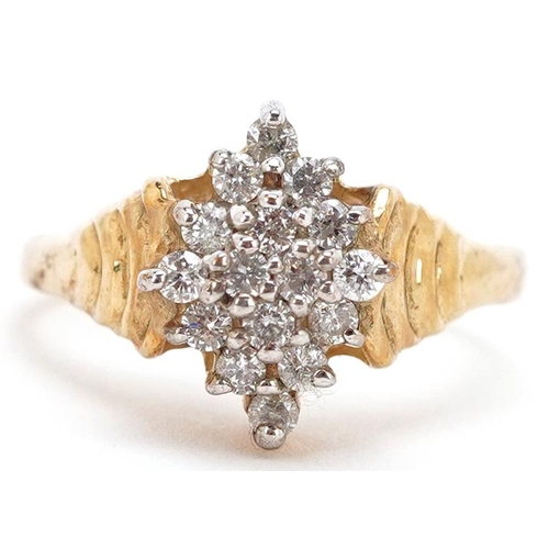 2064 - A 9ct gold diamond three tier cluster ring, size N, 3.4g.