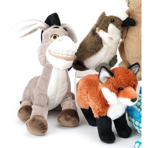 524 - A group of various stuffed toys including a Steiff dragon and a Douglas fox.