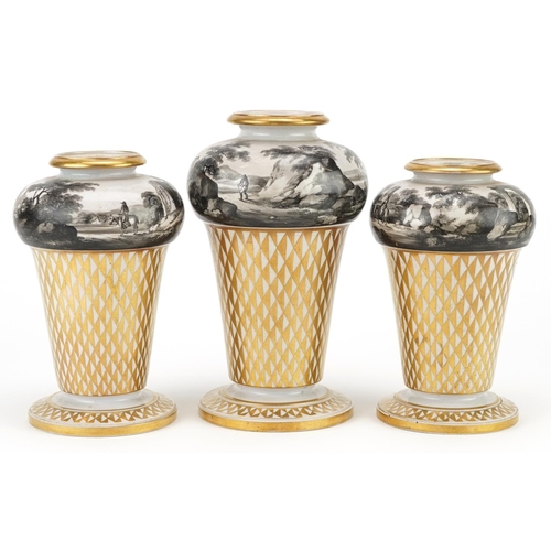 74 - A garniture of three early 19th century English porcelain vases with gilt decoration, each painted w... 