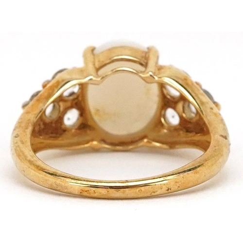 2366 - A 9ct gold cabochon opal and white topaz ring, size N, 4.0g.