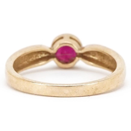 2281 - A 9ct gold ruby solitaire ring, size N, 2.6g.