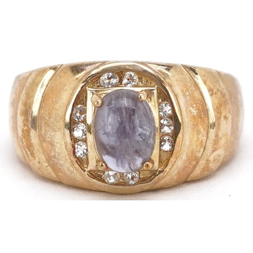 2070 - A Modernist 9ct gold cabochon purple stone and white spinel ring, size T, 8.2g.