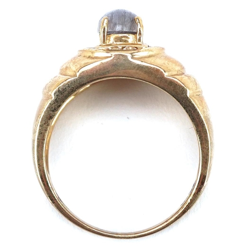 2070 - A Modernist 9ct gold cabochon purple stone and white spinel ring, size T, 8.2g.