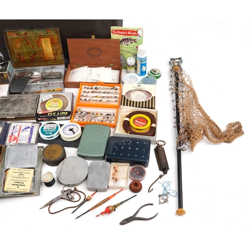 1619 - A collection of various 20th century fishing items including lures, flies, a net, hooks and line.