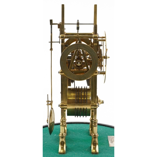 331 - A mid 19th century brass skeleton clock with fusée movement, the circular dial with black Roman nume... 