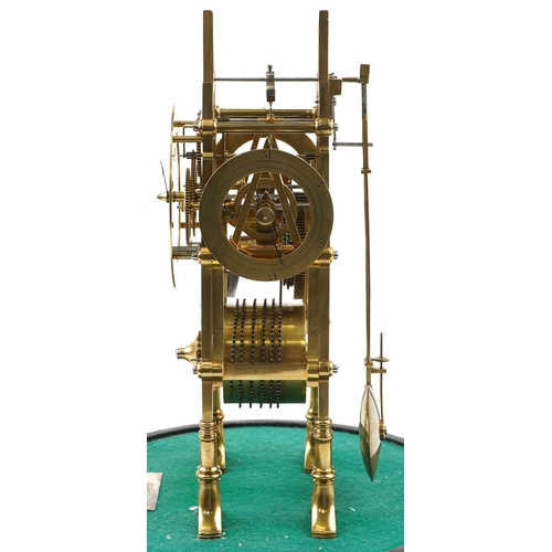 331 - A mid 19th century brass skeleton clock with fusée movement, the circular dial with black Roman nume... 