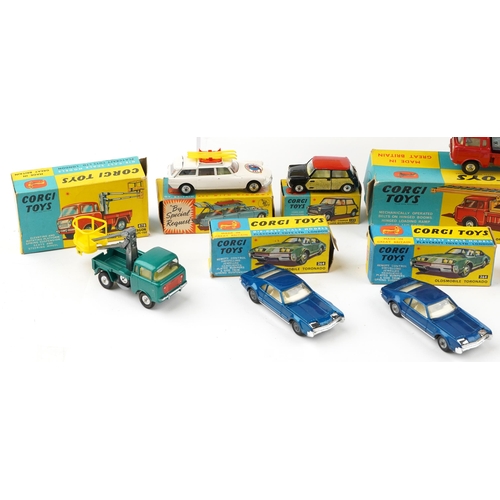 522 - A collection of Corgi Toys diecast vehicles including Green Hornet, Batmobile and The Avengers.