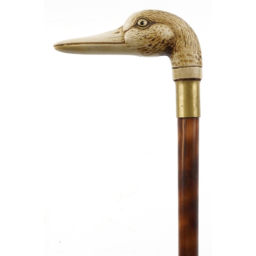 284 - An early 20th century bamboo swordstick with a resin handle in the form of a duck's head.