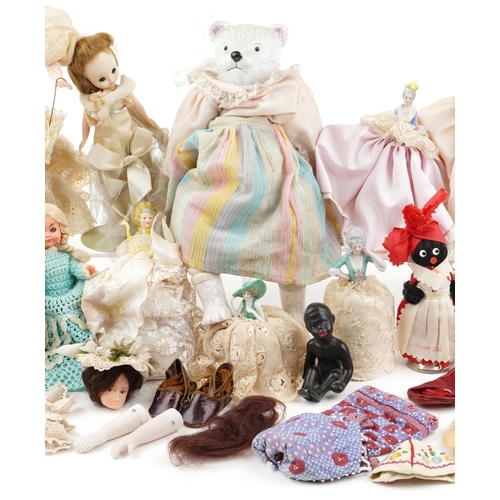 1287 - A small collection of early 20th century porcelain, bisque and plastic half dolls and full length do... 