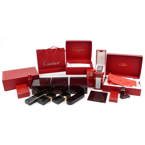 2581 - A small collection of jewellery and perfume boxes by Cartier and Harrods.