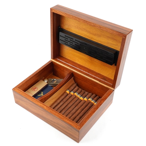 287 - A 20th century Lino coromandel cigar humidor, 31cm wide, with some Cohiba La Habana cigars