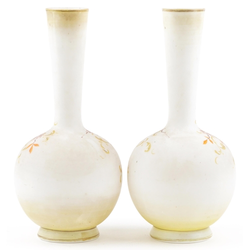 252 - A pair of early 20th century French opaline glass bottleneck vases, each with hand painted floral de... 