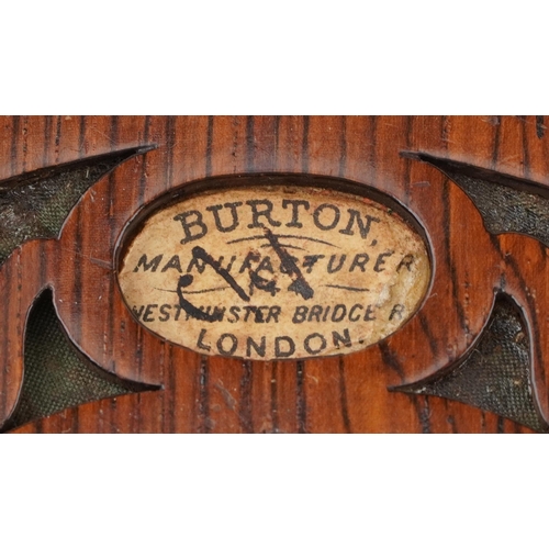 451 - A late Victorian rosewood forty eight button concertina manufactured by Burton, London, with it's or... 